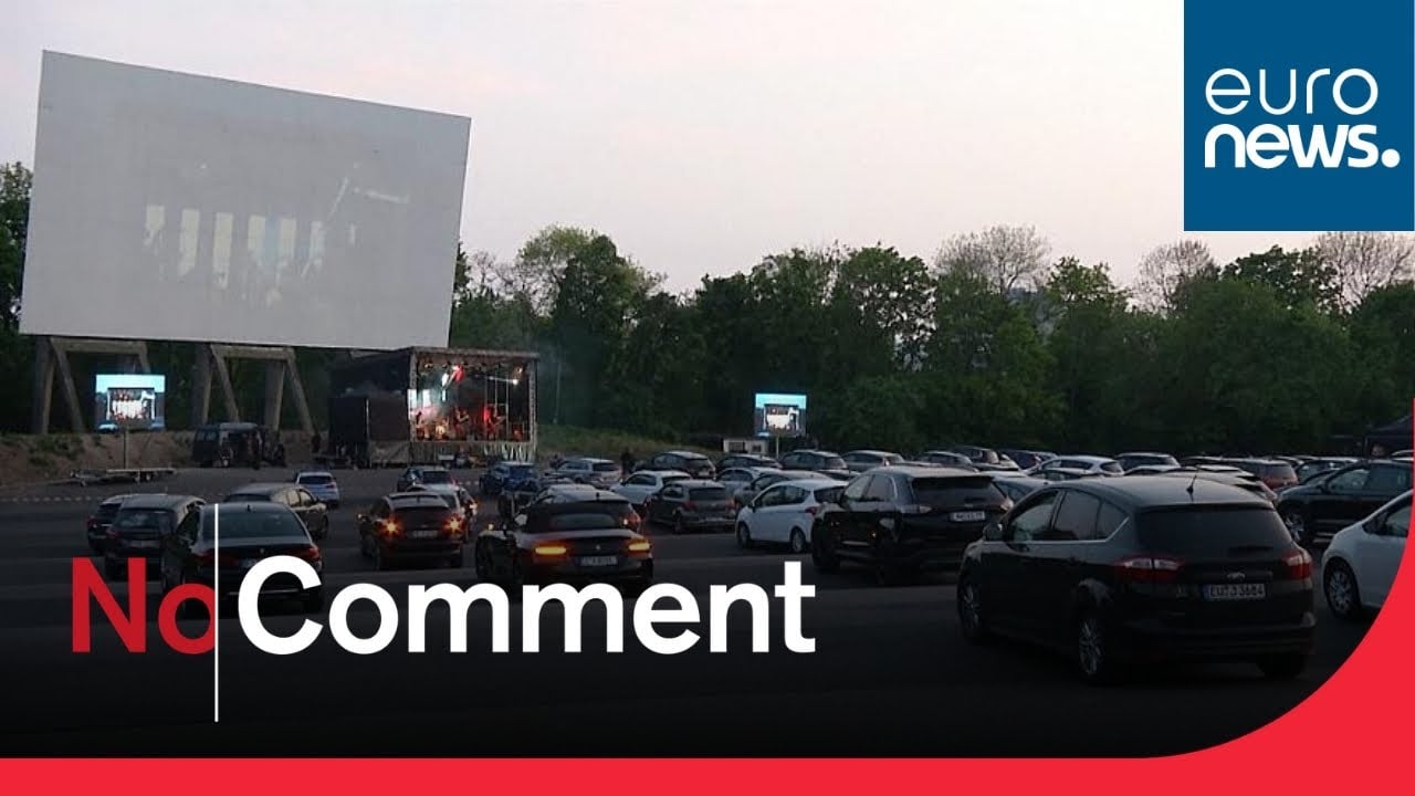 Let's party! People attend German concert drive-in cinema style